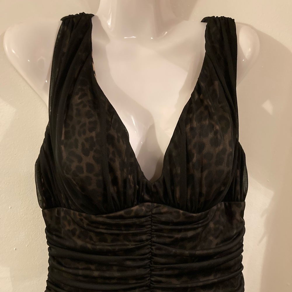 ON HOLD  animal print dress with a layer of black transparent material.
